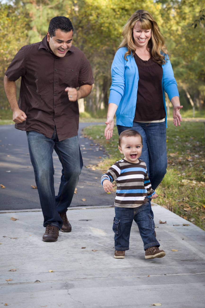 Happy family walking and smiling